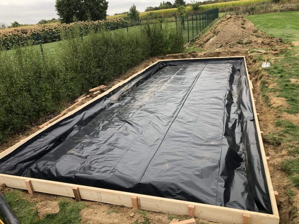 Graven en storten van de fundering voor een stevige bouwconstructie door felyn